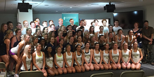 The Georgia Tech Cheerleaders pose after an Irish trad session with Consul General Stephens