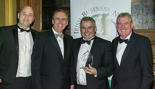 Cathal Doherty and JP Garvan of Roadbridge, winner of the Ireland Scotland Award, pictured with Minister of State McHugh and Kevin Sherry, Executive Director, Enterprise Ireland