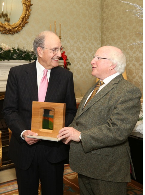 Senator George Mitchell recieves PDSA from President