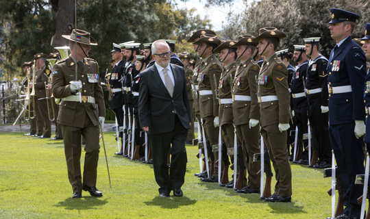 Ambassador Ó Caollaí. Inspecting guard of honour