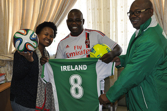 Presentation of jerseys to School Principal Mr. Selaki Masenya and Coach Mr. Hosea Digashu by Belindah Phalatse from the Irish Embassy.