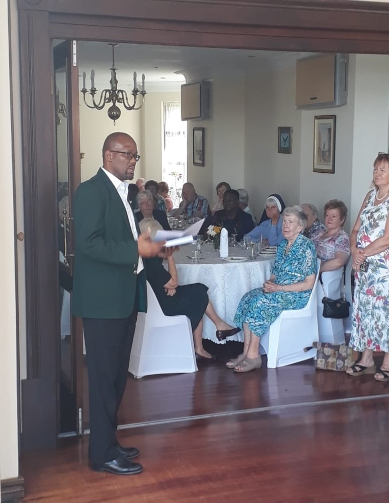 Elias Masilela, who was taught by Irish missionaries, speaking at Irish missionaries' event at residence of Ambassador